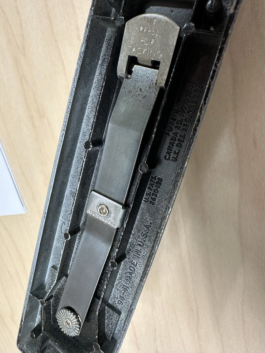 This is a classic Swingline 747 desktop stapler, one of the most iconic and durable office staplers ever made. It features all-metal construction, top-loading design (marked “LIFT CAP TO LOAD”), a reversible anvil for tacking/pinning, and the scripted Swingline logo.
The key clue