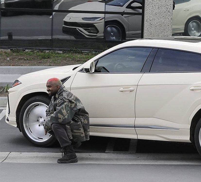 YESEEGHOSTS's tweet photo. That time Kanye started posing in front of his Lamborghini for paparazzi 💀💀 https://t.co/PcUVUlMvBy