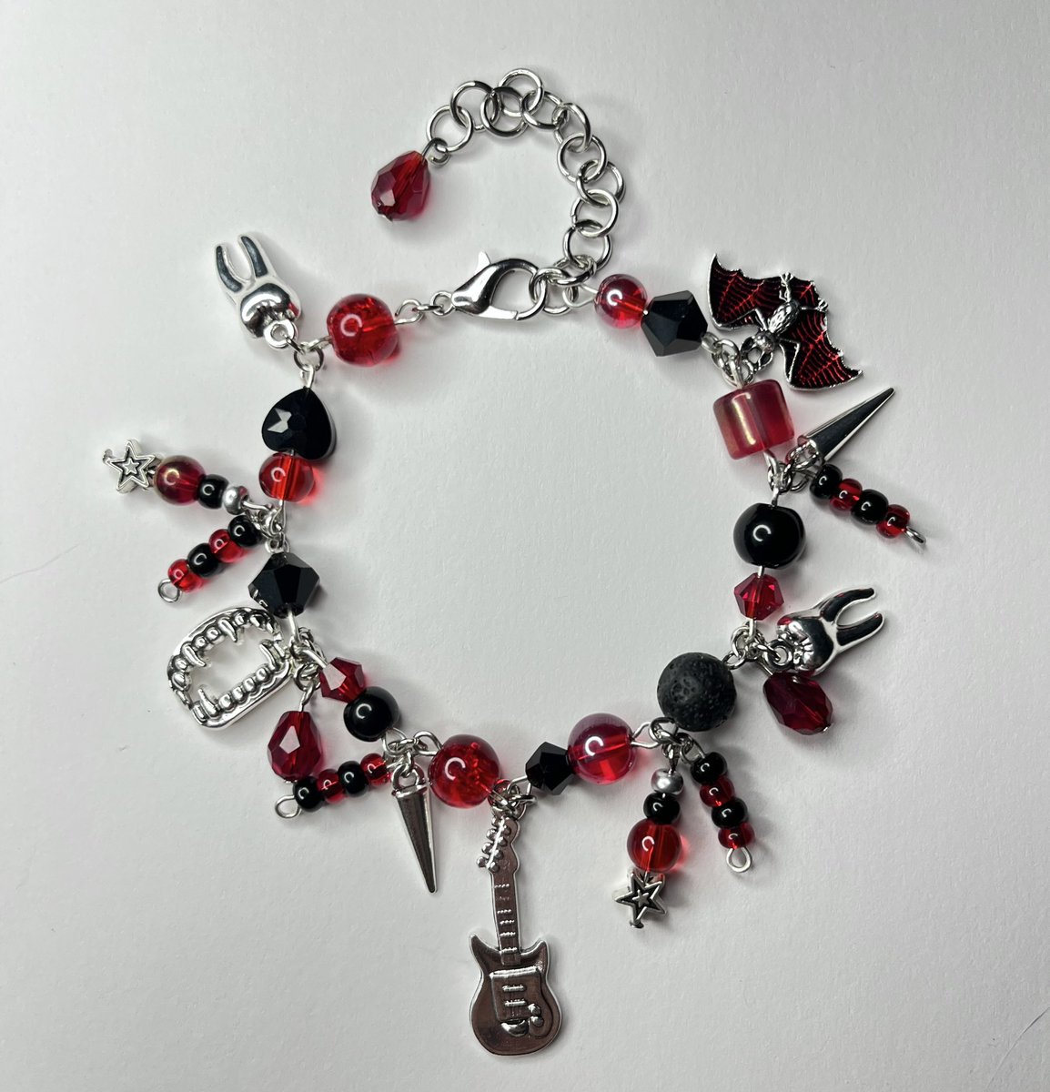 last 2 bracelets till restock! i plan on making another ghrosary, but for now, cardinal copia and bones shredder up on my etsy! ❤️🦇 link in bio