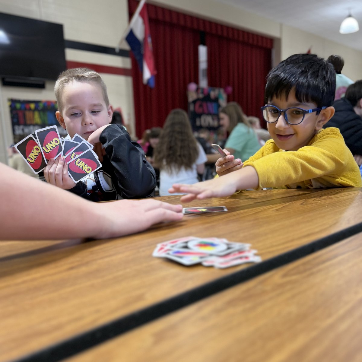 CREfamily's tweet photo. CRE Game Day was an epic win! 🎲♟️ Board games were the centerpiece, but the real takeaway was connection! Our HS STUCO mentors modeling for our young Pirates was next level ❣️ So proud of every student who played today! 🏴☠️💙 #crefamily #hustleheart @bransonschools https://t.co/4HNabQ4I2s