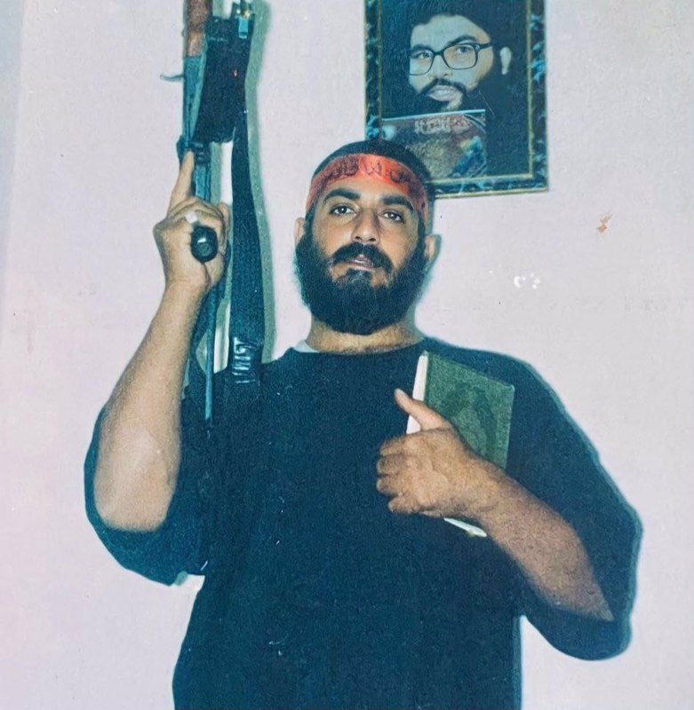 PaliBasiji's tweet photo. Mohammed Shehadeh was one of the Palestinian resistance commanders whose life reflected the deepening ties between Palestinian fighters and the Lebanese resistance axis in the 2000s. After being exiled from Palestine with roughly 300 others, he was received in Lebanon in Marj Il Zuhour with Other martyred leaders Abdel Aziz al-Rantisi, Mahmoud al-Zahar, and Saleh al-Arouri they were hosted and protected by Hezbollah.

That exile was not simply displacement. Under the direct supervision of Martyr Mohammed Said Izadi also known as “Hajj Ramadan” a commander in the Iranian Al-Quds brigades. it became a period of political, ideological, and operational consolidation shaping a generation that understood resistance as discipline, not impulse.

From this experience, Shehadeh went on to found the Martyr Imad Mughniyeh Armed Resistance Group in Palestine, drawing inspiration from Hezbollah’s model and from its military leader Imad Mughniyeh. The group’s first major operation resulted in the killing of eight Israeli soldiers, marking a turning point in its emergence.

After the 2006 thirty-three-day war, Hezbollah’s standing in the occupied West Bank rose sharply. For many Palestinians, including Shehadeh, it was proof that disciplined resistance could shift the balance of power, even against overwhelming force.

In early 2008, both Hajj ImadMughniyeh and Shehadeh were assassinated within weeks of one another—Hajj Mughniyeh in Kafar Sousah, Syria, and Shehadeh shortly after. Shehadeh’s martyrdom came during a retaliatory operation in response to the assassination of Hajj Imad, in northern occupied Palestine tying his final act directly to the cycle of resistance and reprisal that defined that period.

At Shehadeh’s funeral in Bethlehem on March 12, 2008, mourners chanted, “Hezbollah is coming,” reflecting how closely his legacy had become bound to a wider resistance axis linking Palestine, Lebanon, and Iran.
   
His final request was to be buried in the flag Of Hizballah.