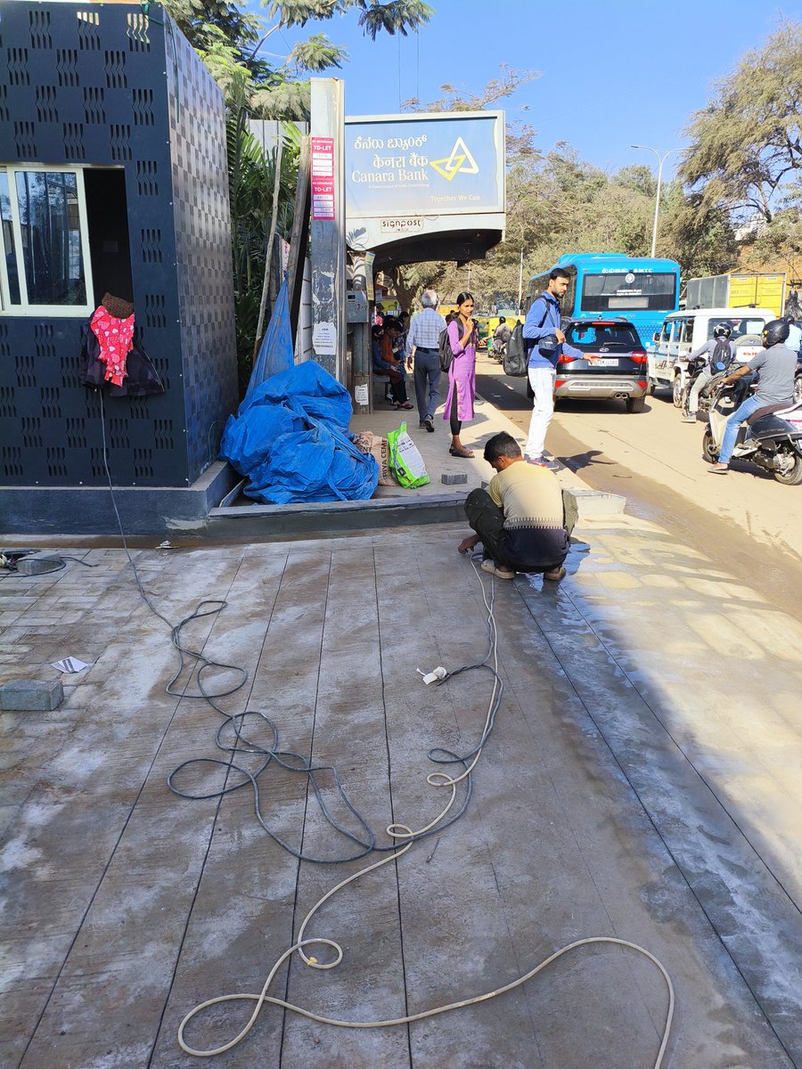 infinitymatrix5's tweet photo. They are litterly occupying public footpath area and creating path to their own property at kundanahalli gate bus stand. Requesting @BlrCityPolice @CPBlr @blrcitytraffic  to please check it once.

#bengalurupolice https://t.co/M0pFV2PKiE