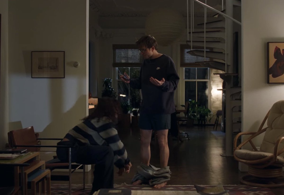 muglare's tweet photo. I have been thinking about the set designs for The Drama ALL DAY. Can’t get over the cool tones with wooden accents and walls covered in art. My eyes locked onto the Isamu Noguchi lamps, the spiral staircase, the Ploum sofa and Marcel Breuer chair immediately. So good! https://t.co/BNggJZ4TE1