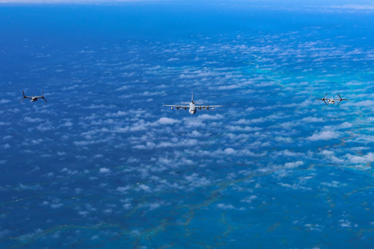 1stMAW_Marines's tweet image. U.S. #Marine Corps MV-22B #Ospreys assigned to VMM-268 fly alongside a KC-130J Super Hercules assigned to VMGR-153 during a flight over the #Pacific Ocean, Jan 27, 2026.