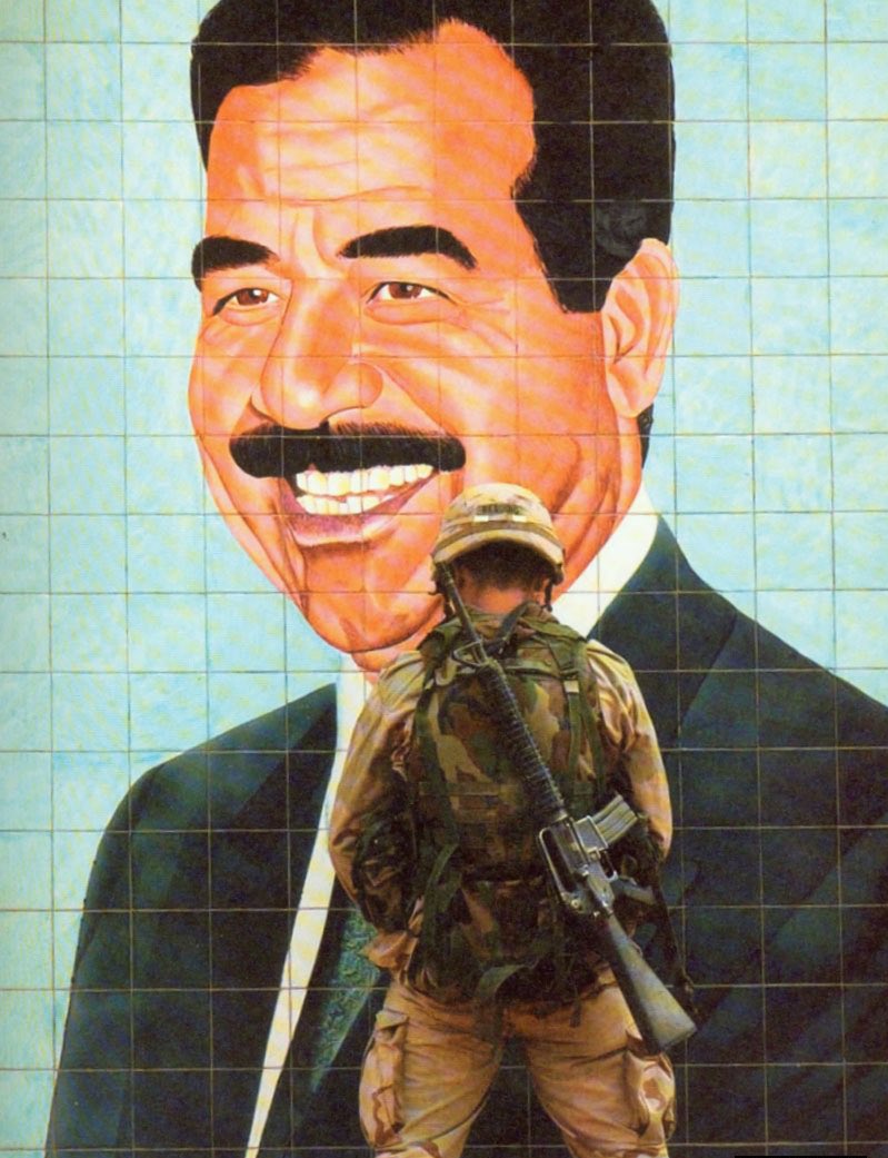 AK74respecter's tweet photo. A U.S. Marine drains the main vein on a mural of Saddam, Iraq 2003. https://t.co/fwKmy1g7yB