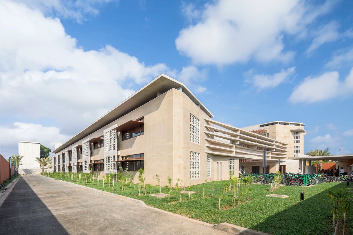 Archello's tweet photo. Designed for extreme heat, the Lycée Français Joseph Kessel by R plus S Architecture relies on wind, mass, and shade rather than machines.
https://t.co/4SbwyZxE6u
#PassiveDesign #BioclimaticArchitecture #ClimateResponsive https://t.co/fKVrgPRbXY