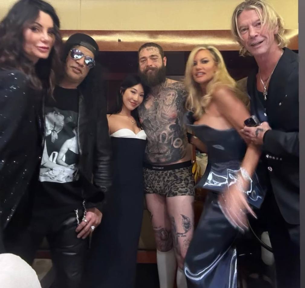 They really decided to take a group pic while he was changing 😭