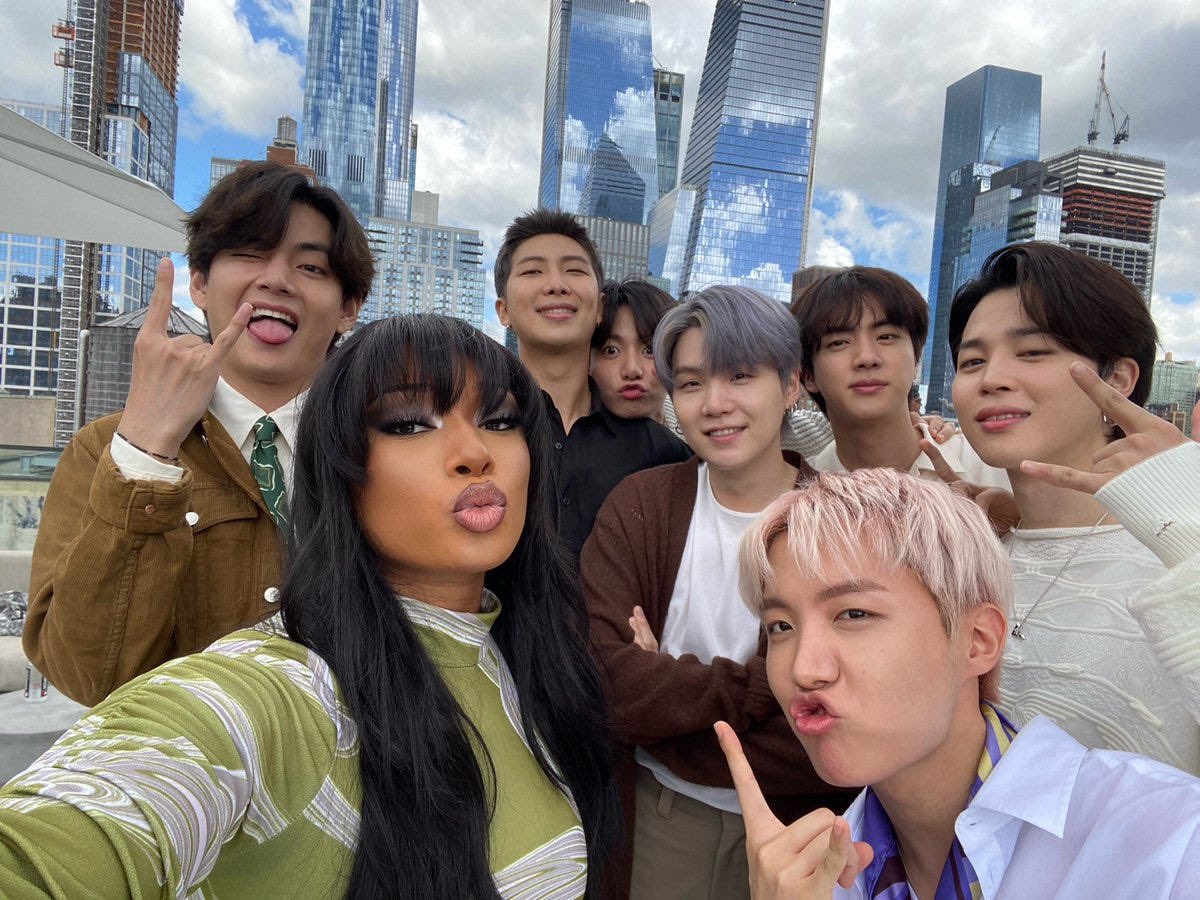 thvsarts's tweet image. every time i see this pic i think of that tweet that says they're a bunch of high school seniors taking a selfie with their fav teacher mr min yoongi