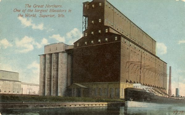 MoundLore's tweet photo. In much of the Midwest, the grain elevator functioned as a coordinating system, not a landmark.

Its operation set daily labor cycles. When the leg started, hauling began. When the pit backed up, everything downstream slowed. Truck lines, rail access, meal breaks, school pickups, even store hours adjusted to whether grain was moving or sitting.

Rail timing was not abstract. Elevators were built where sidings allowed loading, and trains responded to volume. Active elevators meant trains slowed, stopped, or waited. Once throughput dropped, rail behavior changed permanently. That shift alone altered how towns related to the outside world.

The elevator also operated as a financial intermediary. Grain wasn’t always sold immediately. It was stored, advanced against, or held until prices improved. Credit decisions were made locally, based on harvest history, land knowledge, and reputation. This created a feedback loop between agriculture, cash flow, and daily stability.

Weather knowledge concentrated there. Moisture levels, spoilage risk, and bin temperature were tracked continuously. People understood coming storms, heat waves, and storage failures through physical indicators, not forecasts. The elevator acted as an early-warning system tied directly to survival.

When an elevator closed, the impact was not just job loss. The town lost synchronization. Labor became asynchronous. Rail service decoupled. Businesses shifted from predictable hours to defensive ones. Time stopped being shared.

Most of these structures still stand because they were built to last. Their persistence isn’t symbolic. It’s infrastructural. They mark where coordination once existed and where it was removed.

The grain elevator mattered because it aligned people, capital, transport, and time into one system.
When it disappeared, those systems didn’t vanish. They fractured.