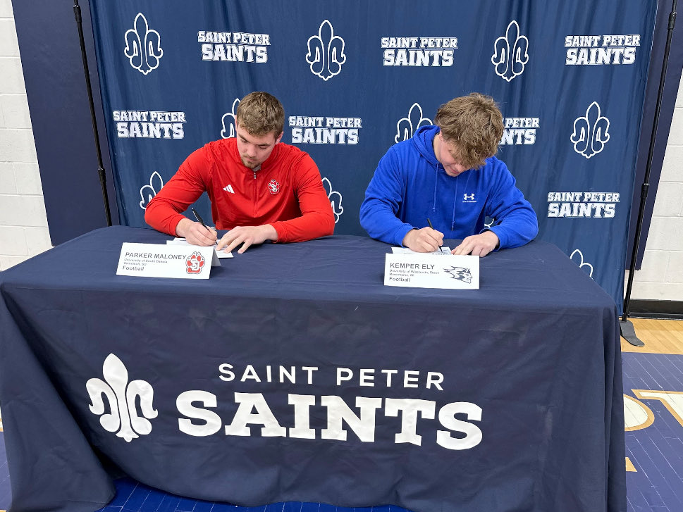 StVarsity2025's tweet photo. These two spent the last 4 years practicing against each other and playing side by side. As leaders and teammates they exemplified Saints football. Today signing letters of intent side by side one last time. Parker with University of South Dakota and Kemper with UW-Stout. https://t.co/7uDtARtY5j