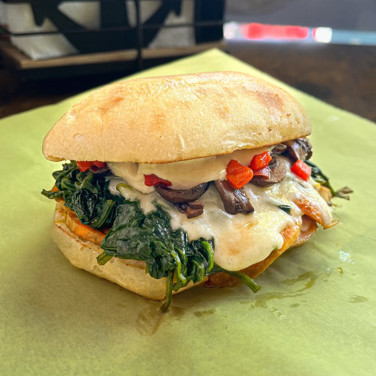 Bite into the bliss of our Buddha Call Sandwich! Packed with roasted yams, sautéed spinach, red peppers, mushrooms &amp; tahini sauce. It's a fan favorite for a reason! 🥪🌿💕 #NowMakeMeASandwich #TasteTheZen