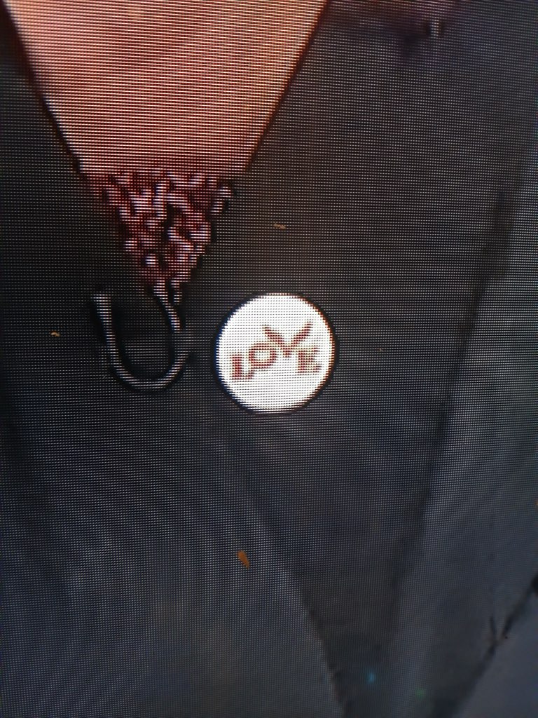 jcomey's tweet photo. @SRuhle my buddy (a big fan of yours) brought your pin to my attention. Is it related to Dave Matthews Band at all? The fanbase created LoVE pins to honor Matt Wadleigh, a fan who brought a LoVE poster to every show he went. 

So, he is curious, as am I. https://t.co/BHuvlWiKh5