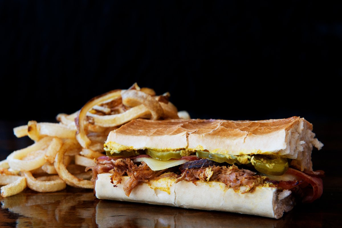 Hello February and hello to February's special...The Cuban! 😍 Slow-smoked pork and grilled ham on a toasted Cuban roll with Swiss cheese, dill pickles, and spicy mustard. We say YES! 🙌