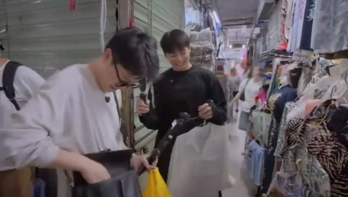 Jimin is a certified market hustler 😭 He got the price lowered for his clothes and then JK immediately asked him to get him a discount too and I was grinning the entire time because I just know I'd be too weak for that smile and give him free stuff 🤑