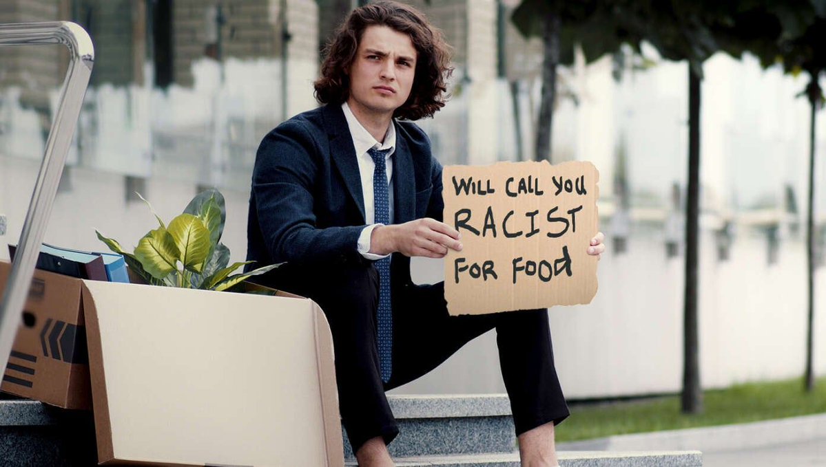 TheBabylonBee's tweet image. Laid-Off Journalist Sits On Street Corner With Sign Reading 'Will Call You Racist For Food' buff.ly/3XIpkpr