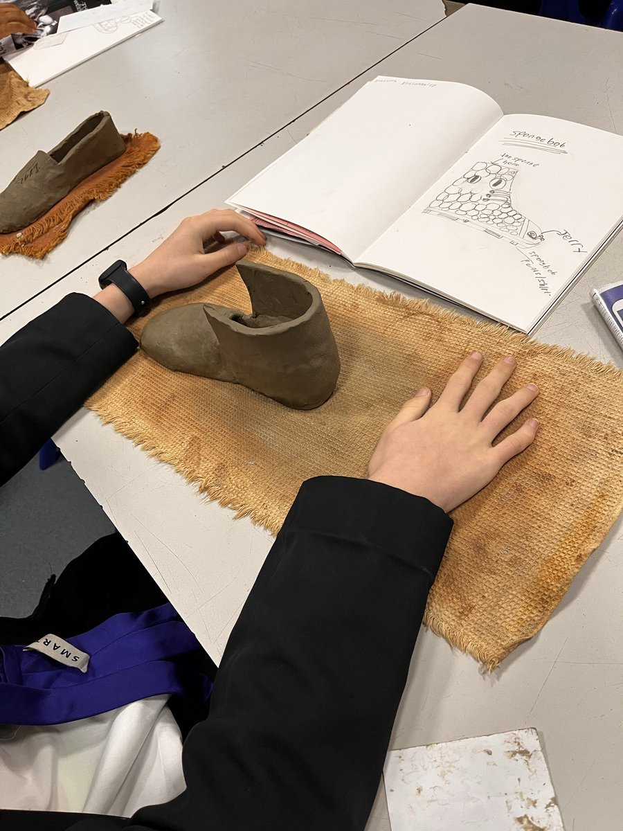 SchoolHeys's tweet photo. #WeAreTHS Year 9 explored clay footwear in Art today, designing and hand-building a shoe. Pupils experimented with texture and surface decoration as they shaped forms. Great focus and creativity from everyone — these pieces show strong craftsmanship and imaginative thinking. https://t.co/WDftkMKyvs