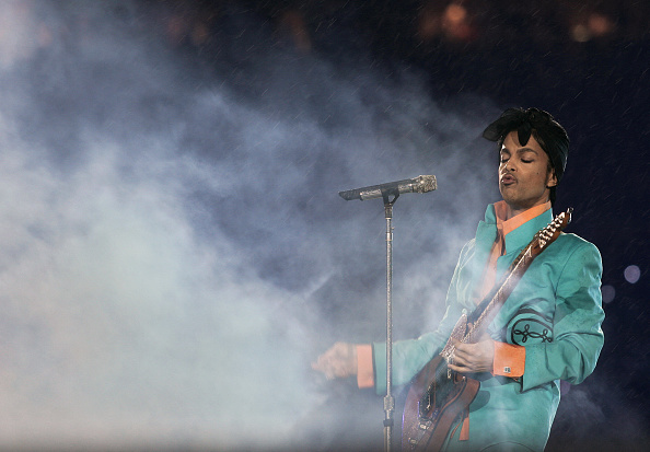 OTD IN 2007 - Prince wows at the Super Bowl halftime show, closing with an otherworldly rendition of "Purple Rain" in the rain.
His 12-minute set: Let's Go Crazy, Baby I'm a Star, 1999, and the Foo Fighters Best Of You (to the delight of Dave Grohl, who didn't know it was coming)