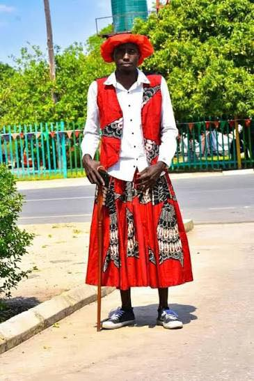 MacJordaN's tweet photo. Imagine Zambians are trolling President Mahama for wearing Fugu. 

Imagine people who dress like they’re late for a 1970s choir rehearsal trying to critique our majestic Northern Fugu. #Zambia #Ghana https://t.co/rGfFeeNxPS