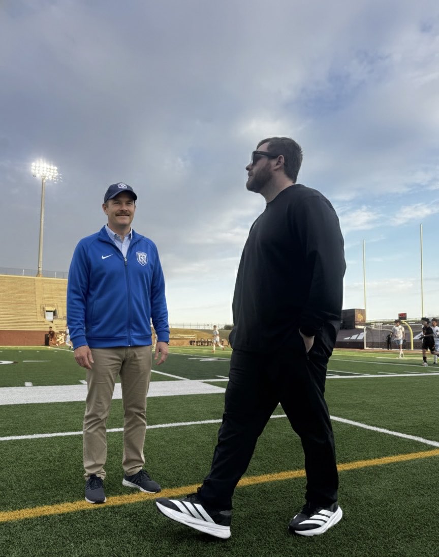 DPHSMensSoccer's tweet photo. Coach Lasso and coach Dumatrait discussing the 'Total Football' strategy. So far, the strategy is: 'Everyone run toward the ball and hope for the best.' The goalie is playing left back ! 🏃‍♂️💨
#CoachDumatrait Vs #Brazoswood https://t.co/UVm9CuXkPf