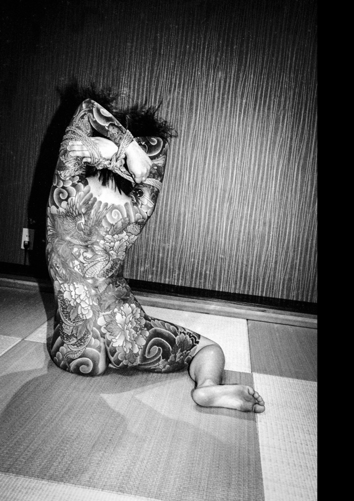 RevokePhoto's tweet photo. Ronin De Goede is a contemporary Dutch analogue photographer and printer, known for his intimate, high-contrast black-and-white imagery. His work is deeply informed by Japanese (sub)culture, including traditional Japanese tattooing and fetish culture. https://t.co/jP962WzjmZ
