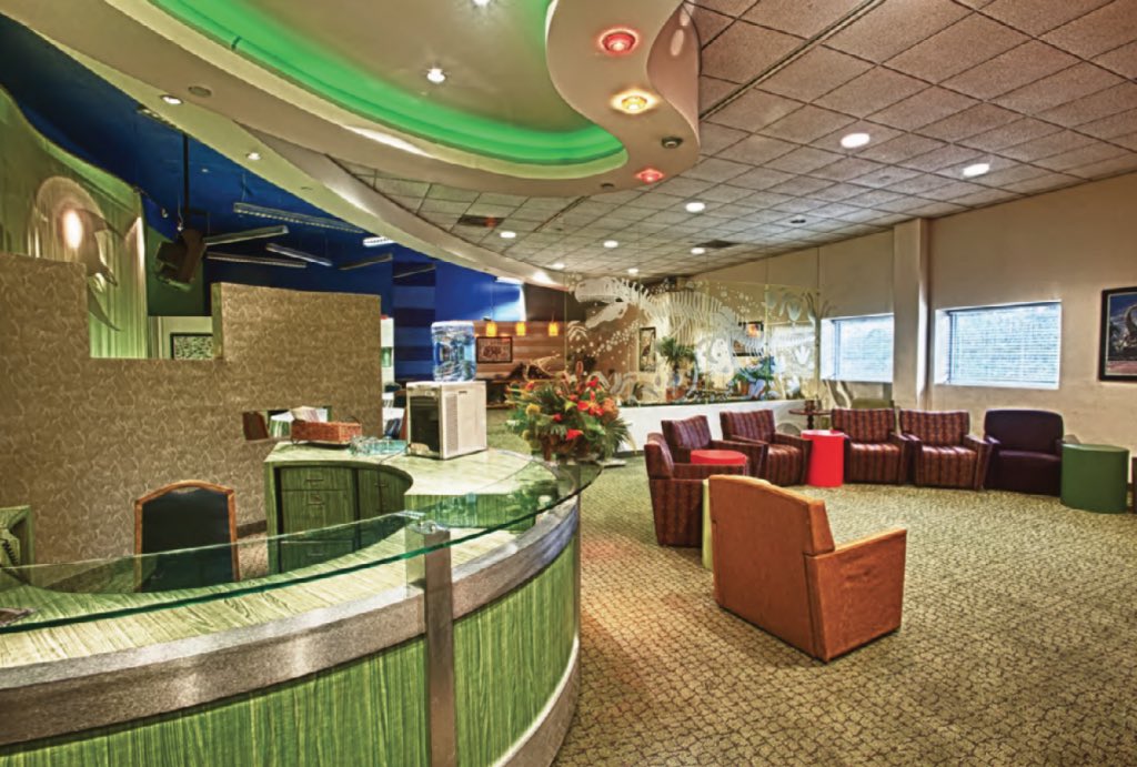 Dr_GrantSeeker's tweet photo. I finally have discovered pictures of the private area above the DINOSAUR attraction! The Dinosaur Lounge could be reserved any time as a dining, meeting, or networking space. It could be decorated and themed for any event and seated up to 80 people. Sponsored by McDonald’s! 🍟🦕 https://t.co/YytnAErjC1