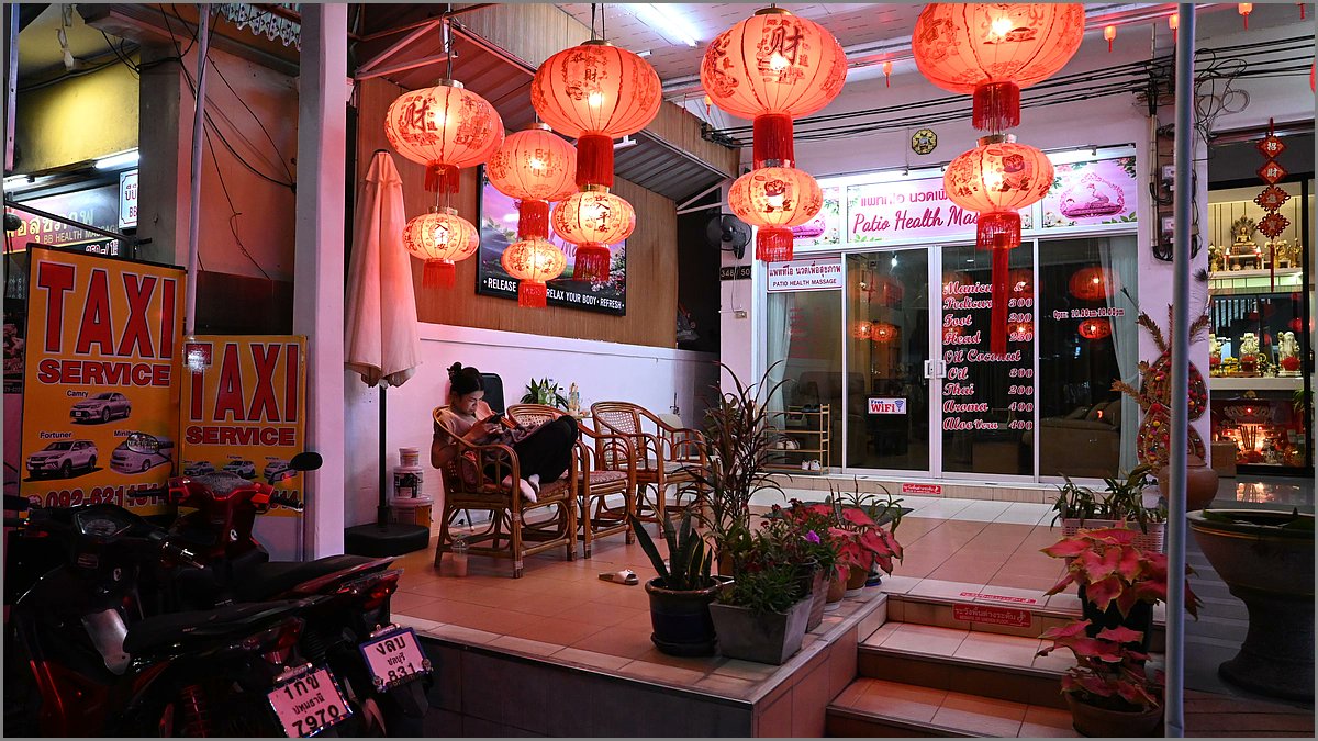 Waiting for my taxi or starring in a low-budget lantern commercial - which role would you audition for and why? #PattayaNights #TravelThailand #StreetVibes #Wanderlust #FunnyPhoto