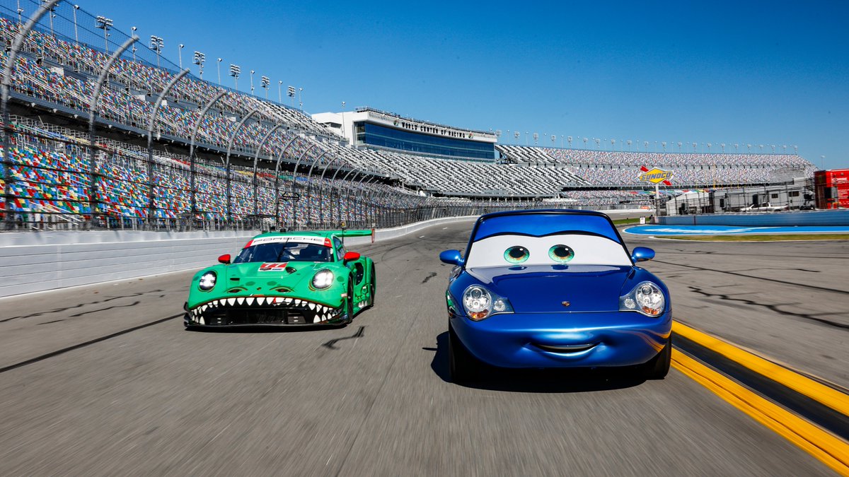 PorscheRaces's tweet photo. #IMSA - It certainly looks like AI-generated images, but it isn't: #SallyCarrera from the movie #Cars completed some very real laps @DAYTONA. #Porsche factory driver @FelipeNasr was behind the wheel. Sally also appeared alongside @AORacingUSA "Rexy" 🦖 #911GT3R https://t.co/Ft0j63AC9Q