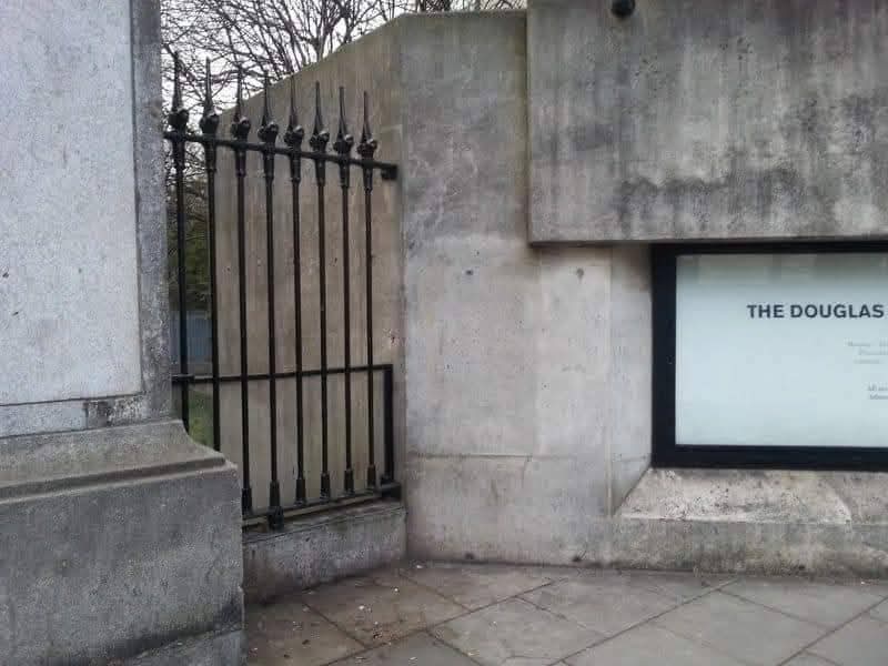 RobLooseCannon's tweet photo. There's a 1,600 year old hidden holy well in a very unexpected place! There was even a cryptic clue to its location, on a now vanished old street sign for Nassau Street. The former Irish name mysteriously said, "Sráid Thobar Phádraig".... Patrick’s Well Road.

Take a closer look near the garden of the Provost's House at the entrance to the Trinity Arts building.From the roadside, you'll see a pillar, a 1950’s crumbling concrete eyesore. Take a gander from the Trinity side, and you'll see a locked gate. Beneath that some Georgian red bricks and mysterious looking steps down to a more ancient stone basin, beneath Nassau Street itself. This is the magical mysterious Saint Patrick's Holy Well!

It was once a famous landmark and pilgrimage site. The well was even the subject of a satirical poem by the Dean of Saint Patrick’s Cathedral, Jonathon Swift. Legend says when the well dried up in 1729, Dean Swift mocked the infamous alcoholism of Trinity students, implying that in their debauchery, they'd drunk the well dry.

Centuries later, in 2009, a structural survey was performed due to worries construction of the Luas line could damage the ancient structure. It seems the only action taken was to lock up the well permanently. 

Despite the claims that St. Pats Cathedral Park is the location of the "real" holy well used by our patron saint, archaeology appears to support the ancient Nassau Street site being the primary baptismal well where the first converts in Dublin were bathed.

Ironically it's Catholic fate was tied to the pagan Vikings. The well was originally 40 feet deep, and its opening was at ground level.
But when the last vestiges of the "Thing Mote", the Viking Parliament mound, was demolished in the 17th century some of the debris was spread along what is now Nassau Street, then known as Patrick’s Well Lane. This resulted in it going partially underground and being reduced to 4ft deep. 

In a highly dubious tract in the "Life of St Patrick" from the 12th century the “fountain of St Patrick” was created by the enslaved Welshman himself, Moses style a-la smacking a rock with his magic crozier. Property deeds from 1592 mention it as a feature of the southern border “the lane that leads to St Patrick’s Well to the south of the monastery”. 

Another of the few historical mentions of the well was from an English journalist circa 1610 sardonically noted "On St Patrick’s Day the water is more holy than it is all the year after, or else the inhabitants of Dublin are more foolish upon this day than they be all the year after.” On that day, he wrote, “thither they will run by heaps, men, women and children, and there, first performing certain superstitious ceremonies, they drink of the water”.

One final bizarre and unlikely legend about the well is that frogs were introduced to Ireland when they spawned spontaneously from it, or even due to an unnamed English doctor, “a very good protestant ... to show his zeal against popery”, imported frog spawn from Liverpool and fecked it in. That'll show that pesky pontiff!

SOURCES
Gary Branigans "Ancient and Holy Wells of Ireland" (2012), The History Press 

https://t.co/WeUZ0vyTAI…

https://t.co/j88KZsSWAb…