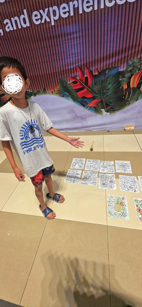 Went to circuit Makati to buy pillows. This kid said he's selling the coloring pages for 50. He will color them in front of you, said he's doing it because he wanted to buy a toy. Found it endearing. And bought two panels. Haha. This the real #ArtFairPh, to be honest. Half charot