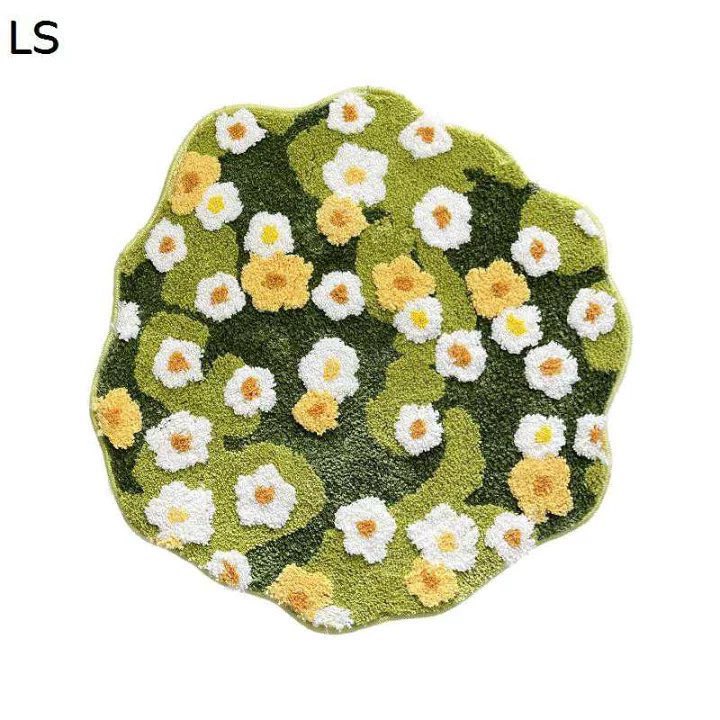 植物の下にお花のラグ敷いたらめちゃくちゃ可愛いじゃないか…