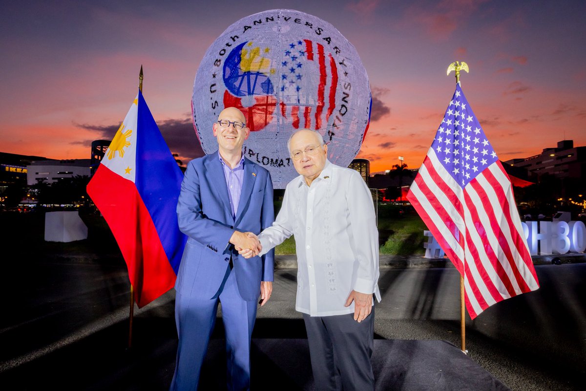 USEmbassyPH's tweet photo. Chargé d’Affaires a.i. Ewing and @PHLAmbUSA Romualdez unveil the #USPH80 logo, marking 80 years of U.S.-Philippine diplomatic relations. Tonight’s celebration highlights the enduring friendship and strong 🇺🇸🤝🇵🇭 ties. #FriendsPartnersAllies https://t.co/RFA0DvDuMW