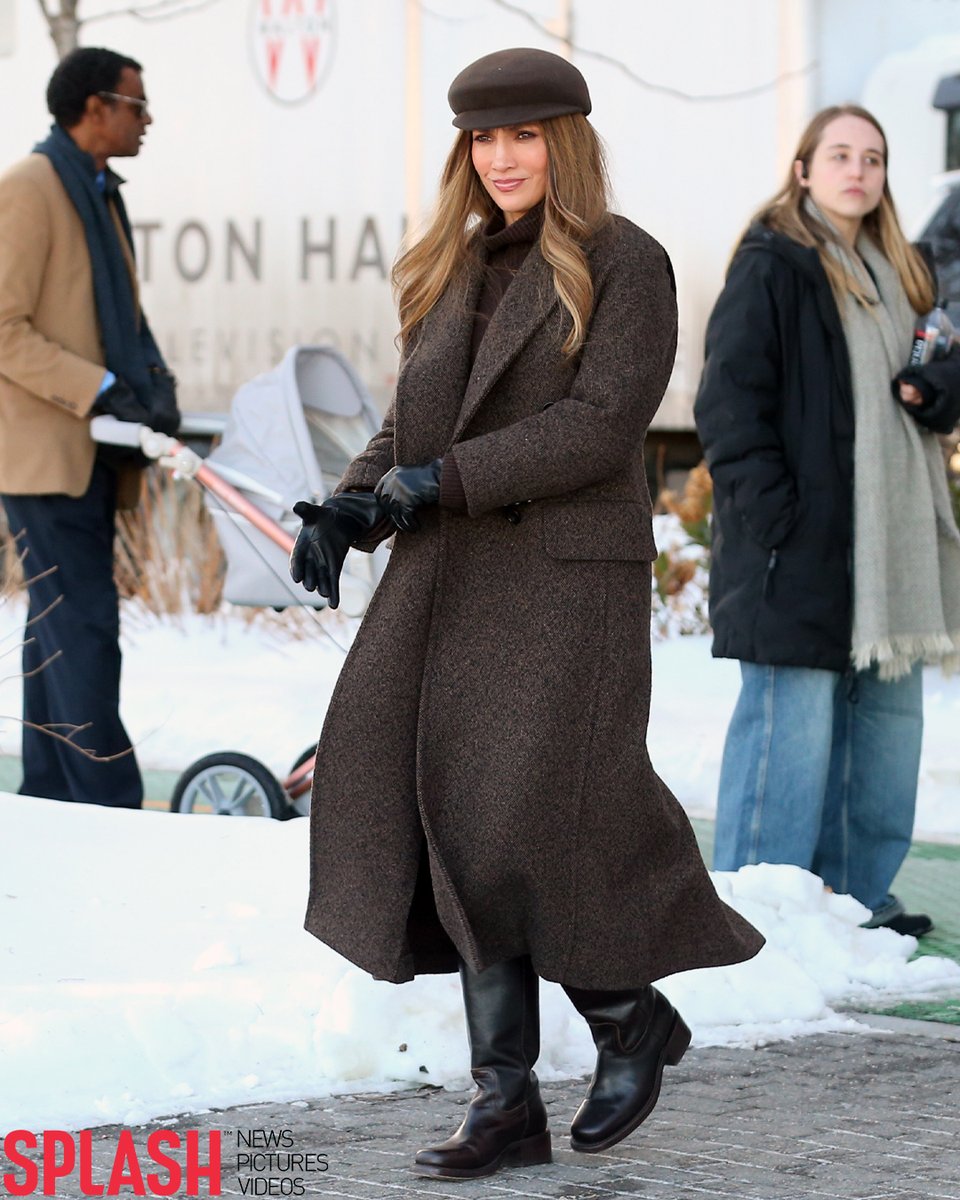 Jennifer Lopez is spotted on set in New Jersey filming 'Office Romance', serving head-to-toe brown tones in a Gigi Burris cap, Max Mara tweed coat and Frye boots 🤎