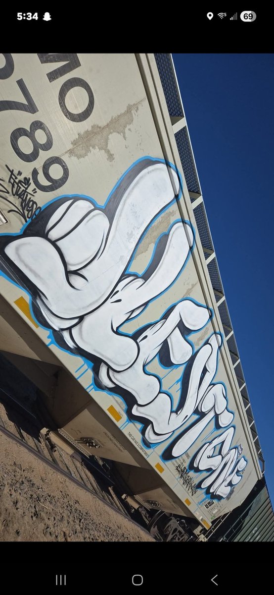 What’s up fam. I’m K-O-K-O, a graffiti artist first — walls, cans, ladders, long nights, cold hands.
I’m leading a project called SPRAY THE CHAIN, and right now we’re painting a massive indoor mural in Madison, Wisconsin that’s pushing into record-breaking territory. But this