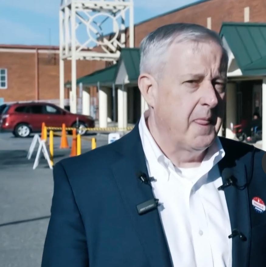 TeamCooperNC's tweet photo. TRENDING: Roy Cooper seen VOTEMAXXING TODAY near NC State. Michael Whatley (low tier DC Swampmonster) hits CATASTROPHIC visible cortisol spike after being BRUTALLY POLLMOGGED by Roy Cooper. https://t.co/rK4MSM7fTn