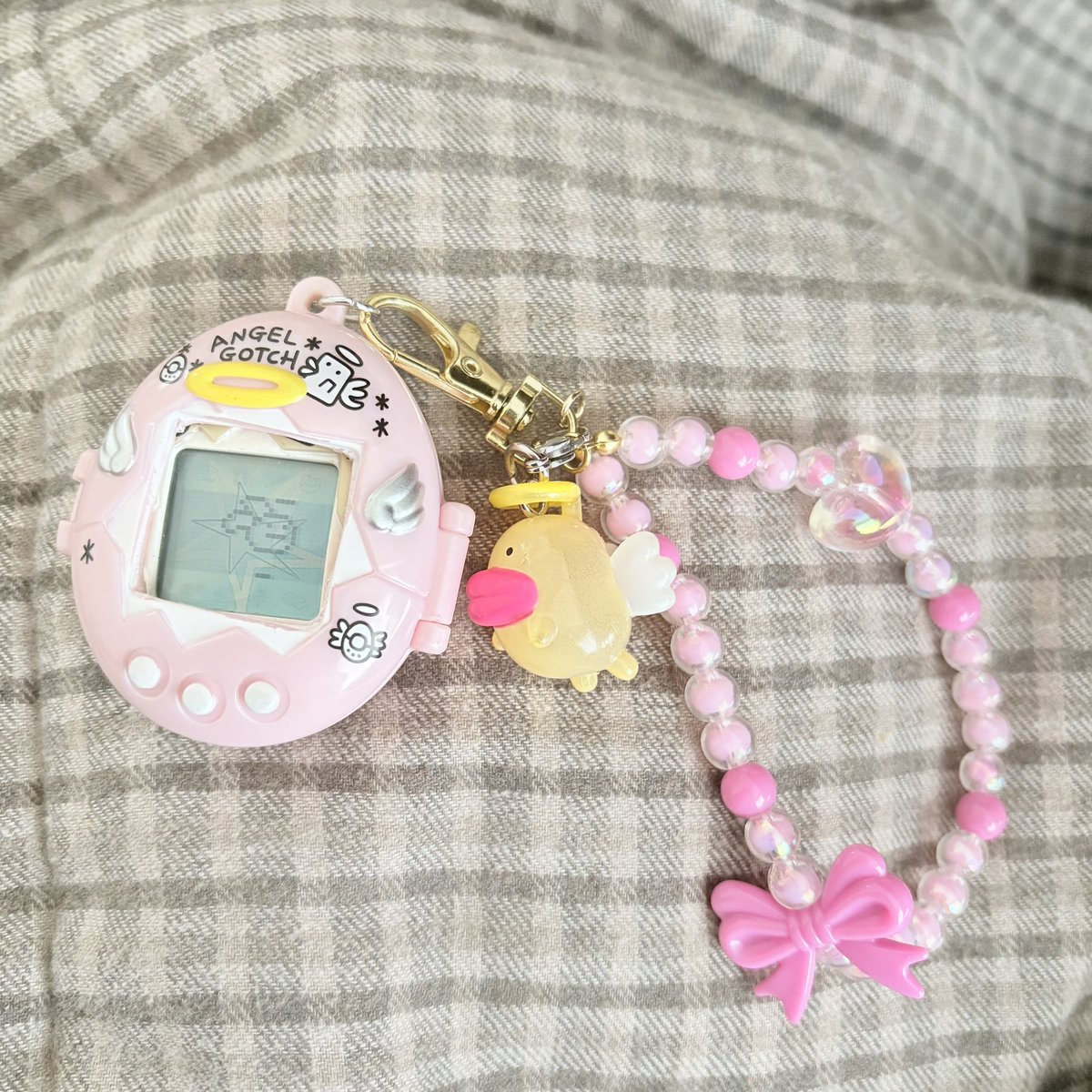 てんしっちのたまごっちケース ピンク てんしっちのケース変えた♡ 前にガチャ回して真ん中繰り抜いたケース