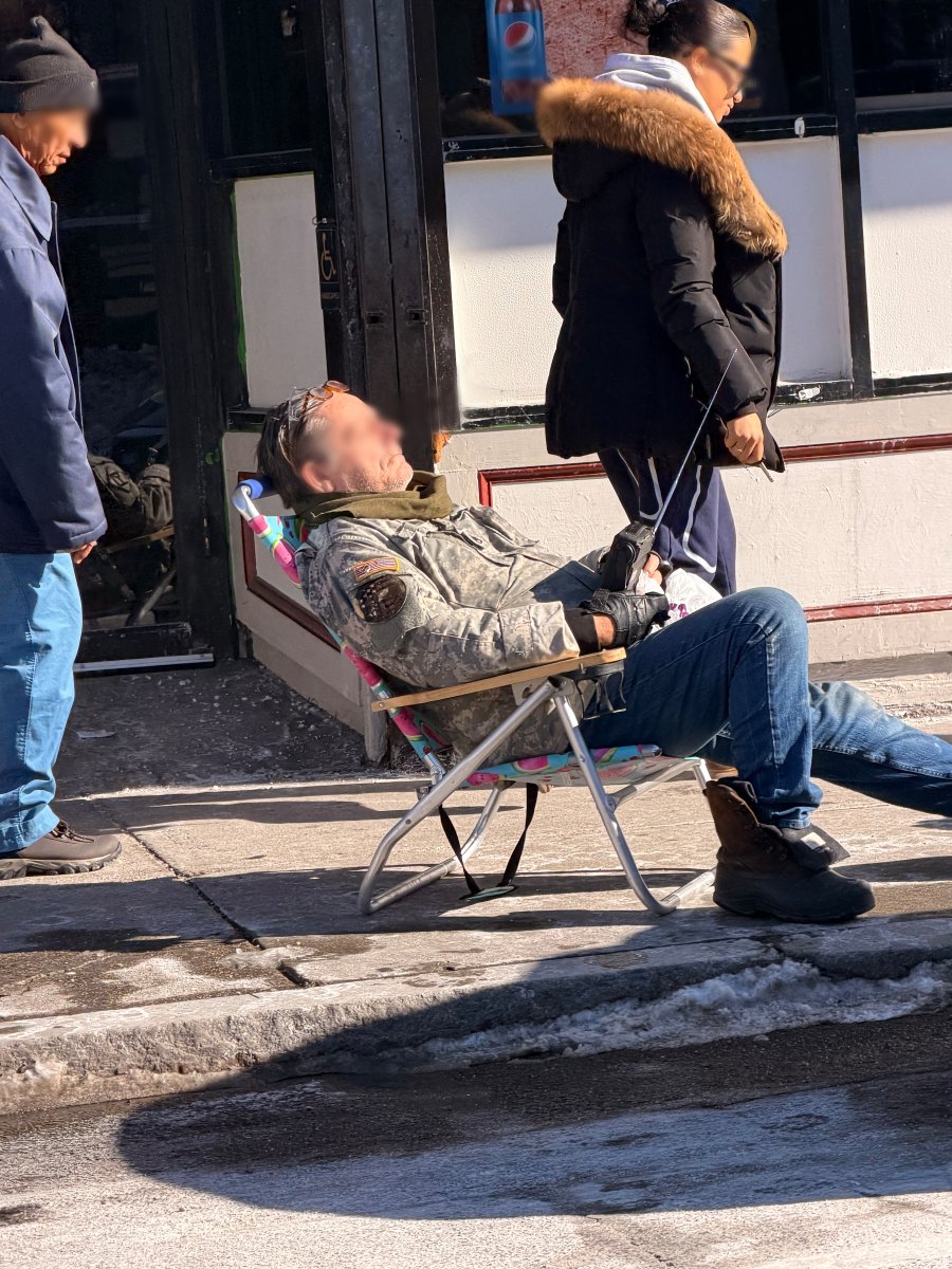 It's 30° out and someone is sunbathing in Jamaica Plain.