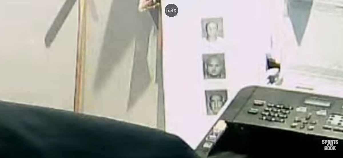 Just a wild guess but the pictures of the 3 guys behind the guest are not family photos