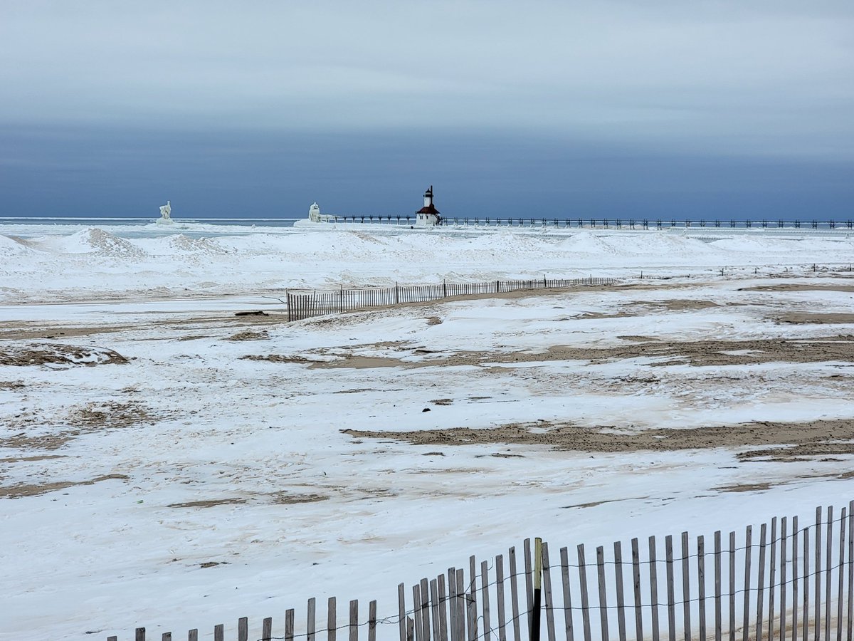 DebMannRN's tweet photo. The #GreatLakes are beautiful. Even frozen Lake Michigan is awesome. The sand mixed with the snow makes beautiful sculptures. Look at that #iceshelf (stay off!) #PureMichigan #SilverBeach So blessed! https://t.co/jWjLcCiWzj