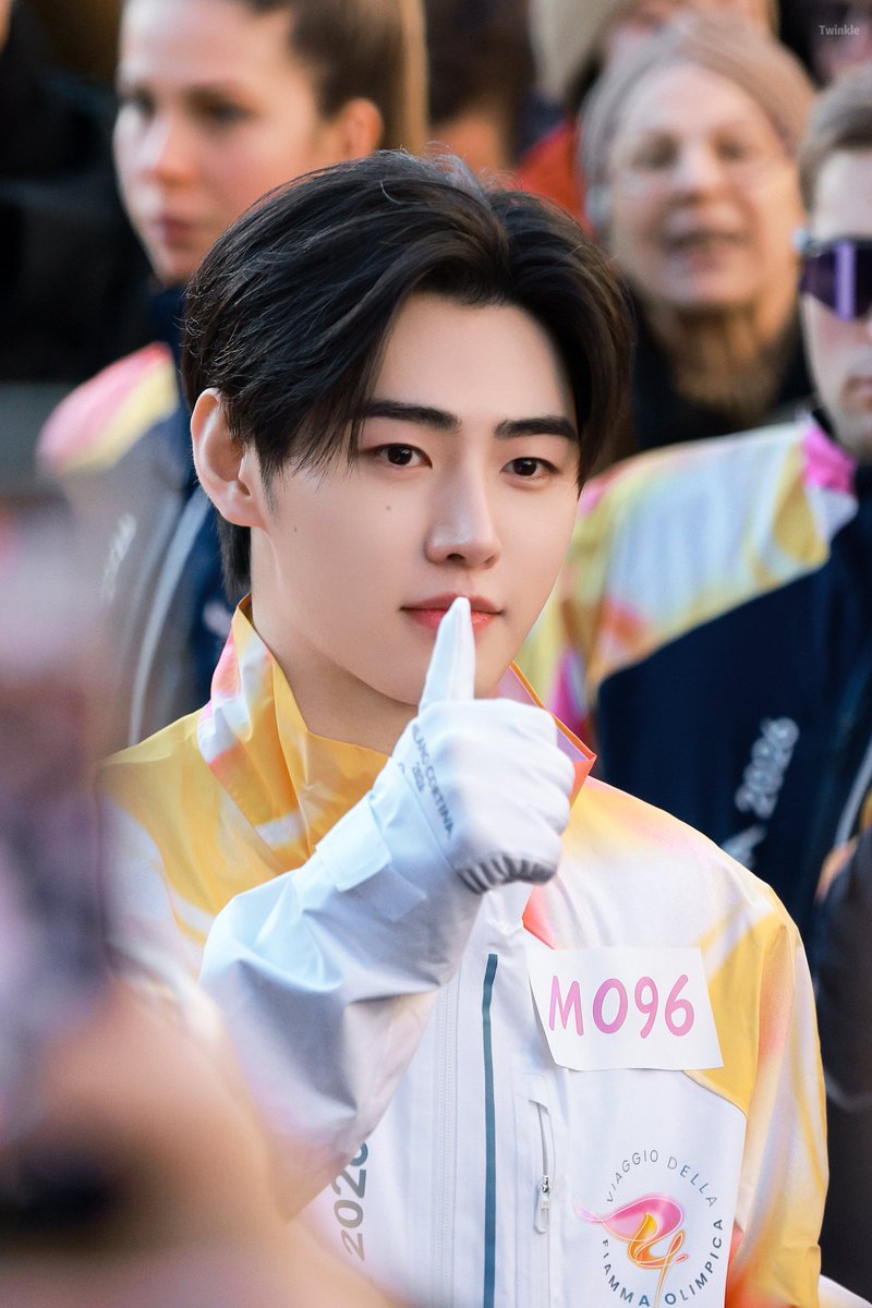 TheePopCore's tweet photo. ENHYPEN’s Sunghoon shows the visuals never clock out, serving face card excellence at the Winter Olympics torch relay in Milan. https://t.co/anfbSud3AH