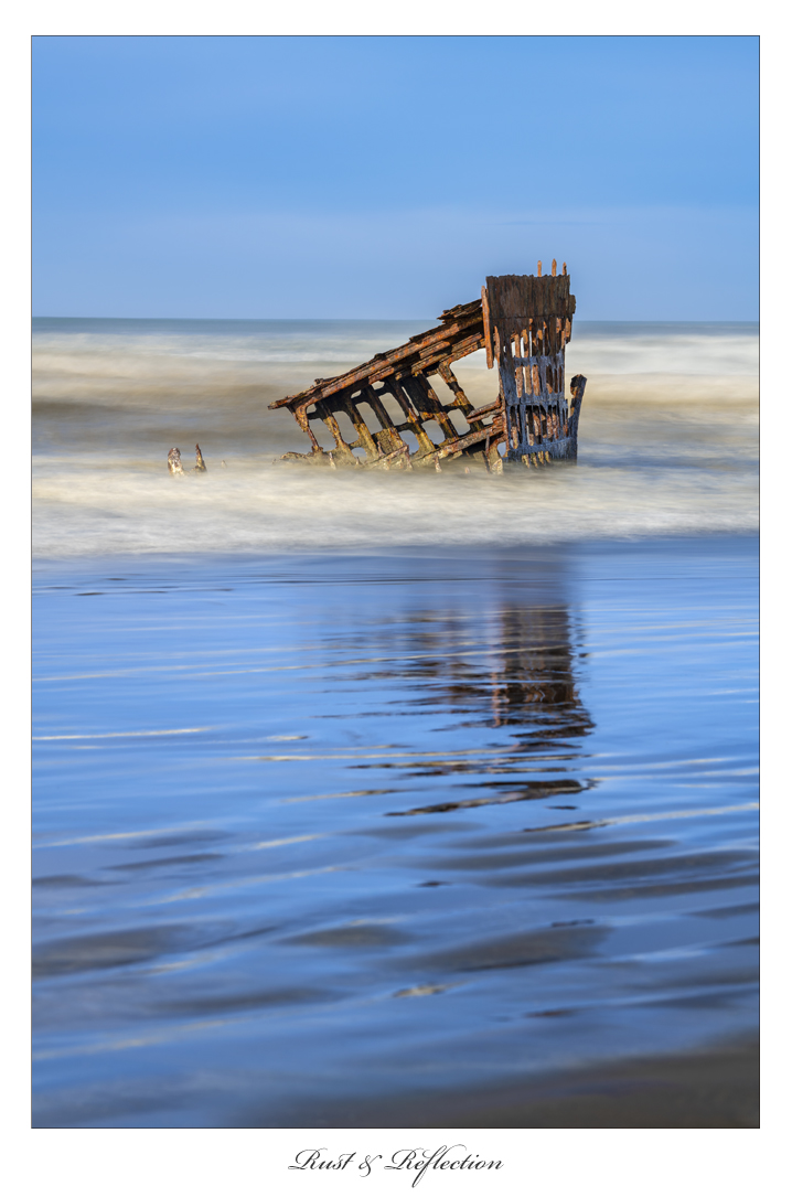 LouisRuth2024's tweet photo. Rust and Reflection
The old shipwreck of the Peter Iredale rests partially buried in the sand, its rusty beams jutting out of the water. Powerful waves mirror its silhouette on the wet beach.
#beach #ocean #shipwreck #peteriredale #louisruthphotography #astoria https://t.co/vDYLsiPjN6