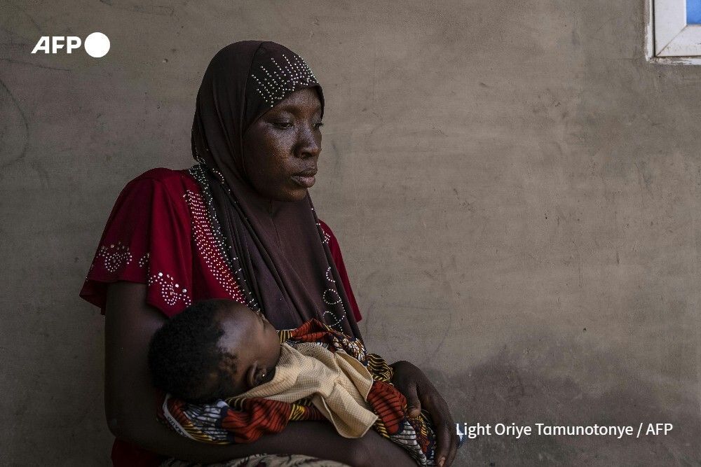 AFP's tweet photo. REPORTAGE: First, the jihadists wrote, saying they were coming to Woro village in central Nigeria to preach. When no one attended, they went on a rampage of killing and arson. The death toll stands at 162 people, and the search for bodies is ongoing. https://t.co/iNHuYKd5DH https://t.co/qsVwwjDnCm