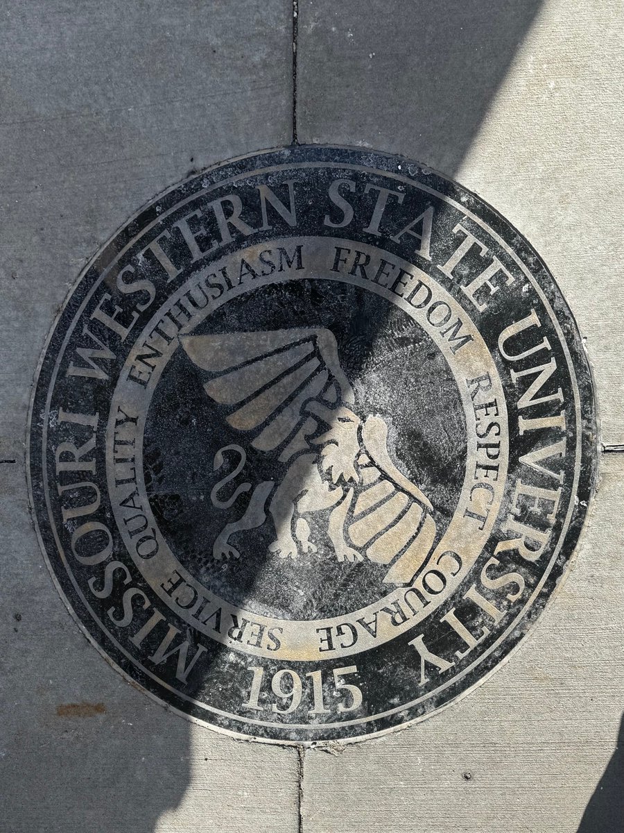 _sydcity's tweet photo. At @MissouriWestern, there is a long-standing campus legend that has been passed down for years. It’s said that if an undergraduate student walks on the university seal, located under the clock tower, they will not graduate. #JOU432 https://t.co/WDZvsLPH0A
