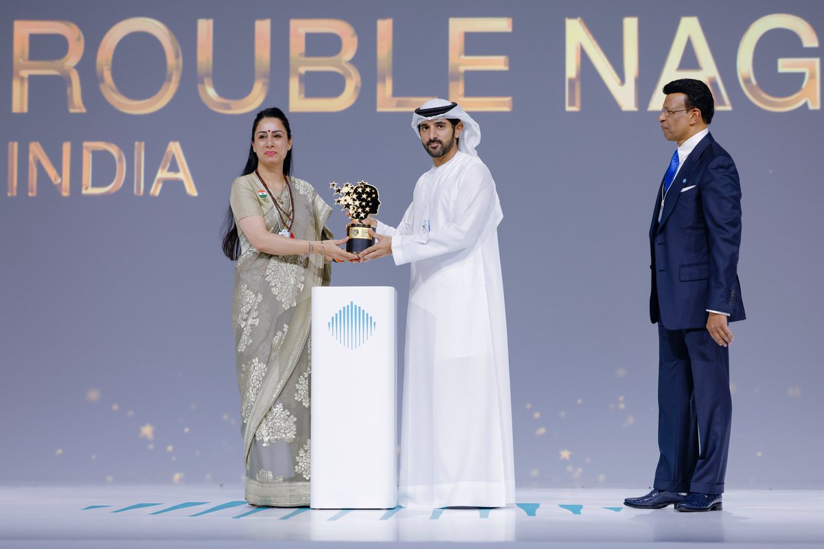airnewsalerts's tweet photo. Indian teacher Rouble Nagi has won the Global Teacher Prize 2026, receiving the one million dollar award at the World Government Summit in Dubai. 

The award, presented by GEMS Education in its tenth edition, was handed over by Dubai Crown Prince Sheikh Hamdan bin Mohammed bin Rashid Al Maktoum.

#WorldGovernmentSummit #Dubai #GlobalTeacherPrize2026 #RoubleNagi