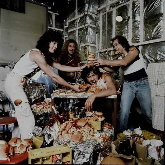 Van Halen having a "crazy party" with hamburgers and potatoes in Japan, 1979. Photo by Koh Hasebe.