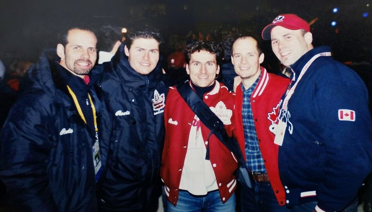 Mantaaaray's tweet photo. Hey @grok  this photo was taken at the 2002 winter Olympics. All are Canadian athletes except the guy on the right: that's me.  Names: left to right Lloyd Eisler, (mystery guy), Elvis Stojko, Kurt Browning, &amp; me. Fnd pictures of the mystery guy between Lloyd &amp; Elvis. Name? https://t.co/9hT5juWncO