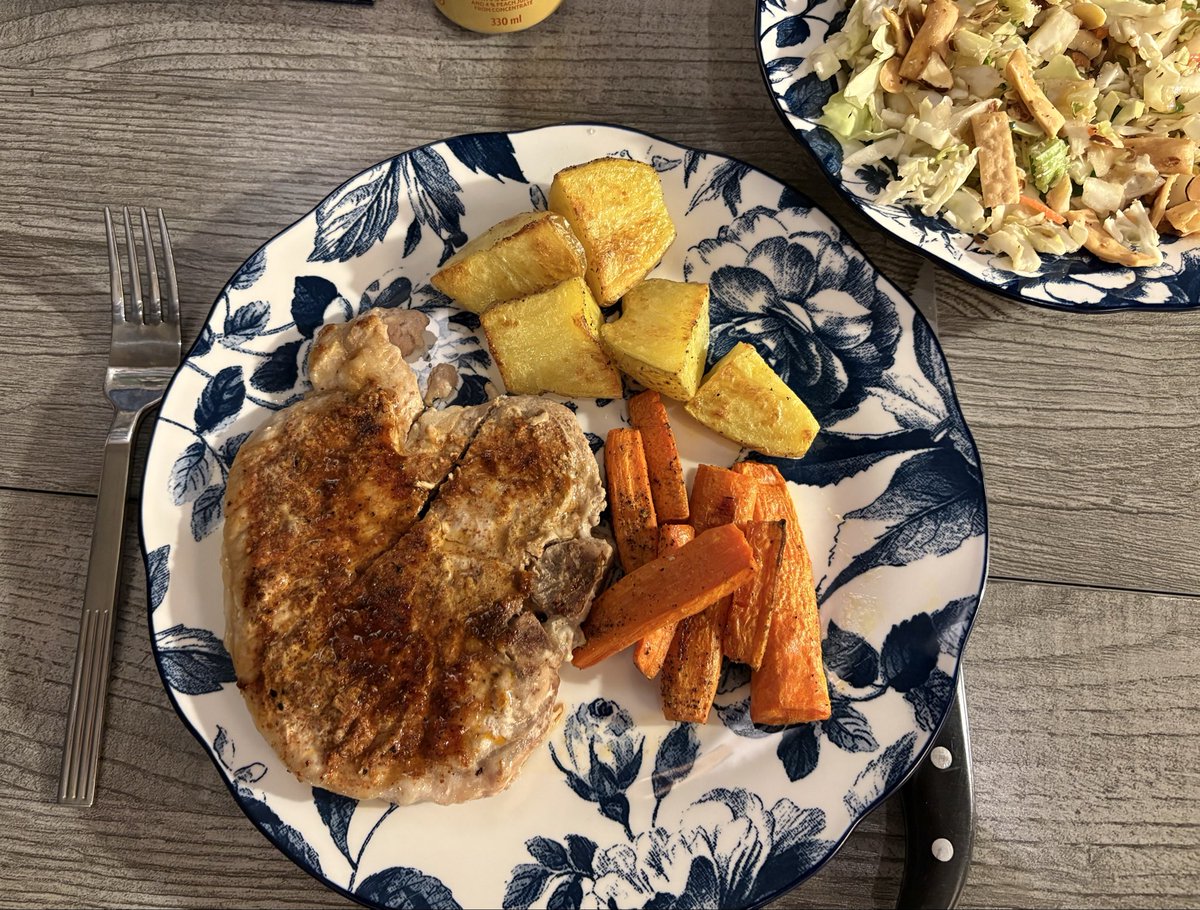 HeatherBYeg's tweet photo. Cajun spiced bone in pork chop, oven roasted potatoes & carrots. Asian chopped salad. #dinnerforone https://t.co/oKKiUQe2aO