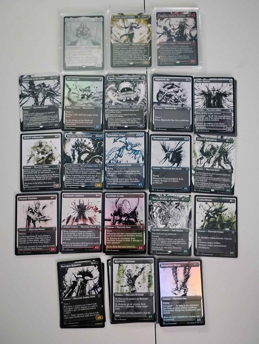 GhostlyPunkin's tweet photo. Just getting back into Magic the Gathering pulled some beauties today. (Yes I love Phyrexia) https://t.co/hxHXBJSvld