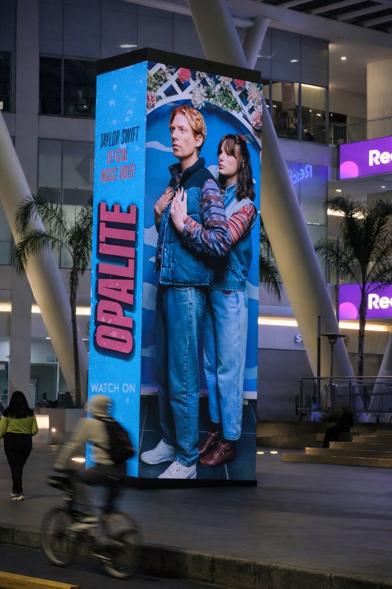 🚨| NEW BILLBOARD OF TAYLOR SWIFT BRUNETTE AND DOMNALL GLEESON FOR OPALITE MUSIC VIDEO. #TaylorSwift