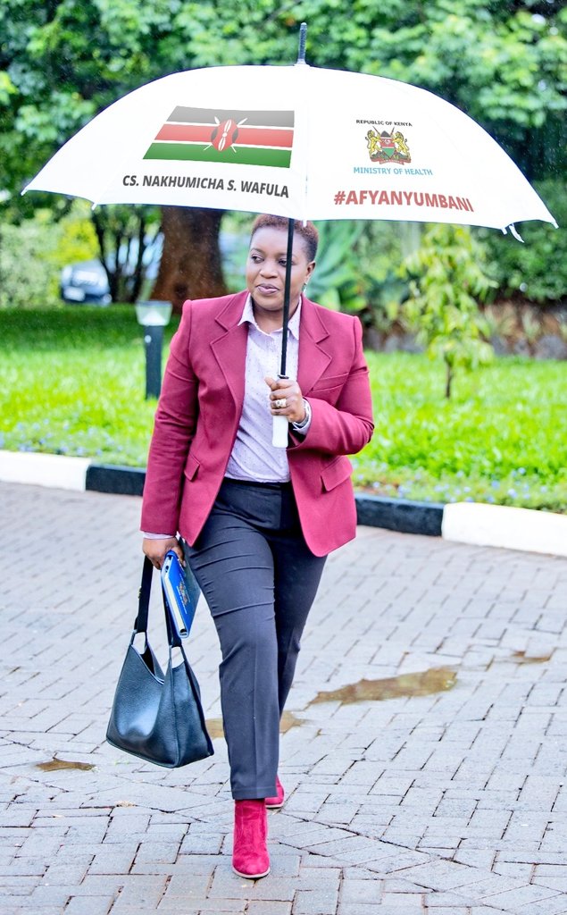 SassySte's tweet photo. @MigunaMiguna She got her own personalised umbrella🌂☔️ to show that she's important? 😲. Who introduces themselves with academic background and job titles? We have a very long way to go! And don't blame our colonisers for this kind of nonsense mindset. https://t.co/TpFq6Dhrc1