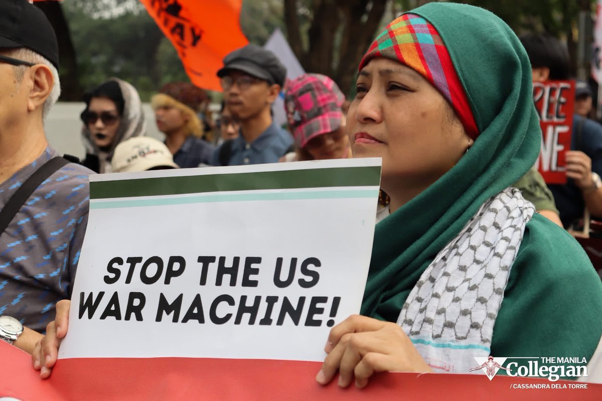 mkule's tweet image. On the Global Day of Action for Palestine and Venezuela, the #GASC60 delegation joined anti-imperialist groups in a troop to the U.S. Embassy, denouncing the persisting presence and aggression of US military across the globe.

 #FreePalestine
#HandsOffVenezuela
